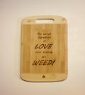 Bamboo cutting board "The Secret Ingredient Is Love, Just Kidding It's Weed"