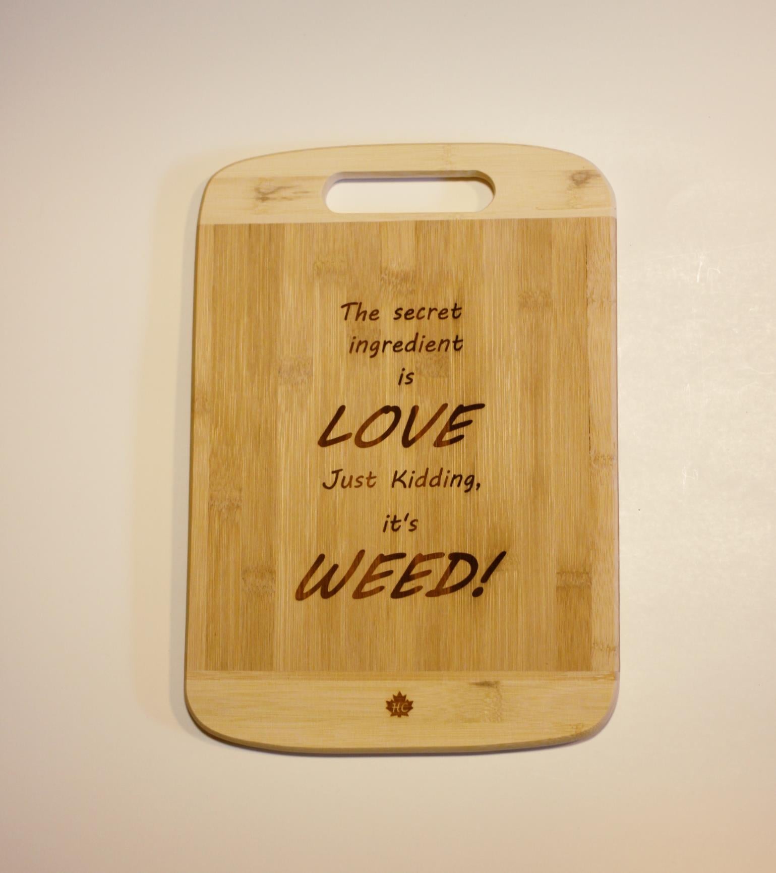 Bamboo cutting board "The Secret Ingredient Is Love, Just Kidding It's Weed"