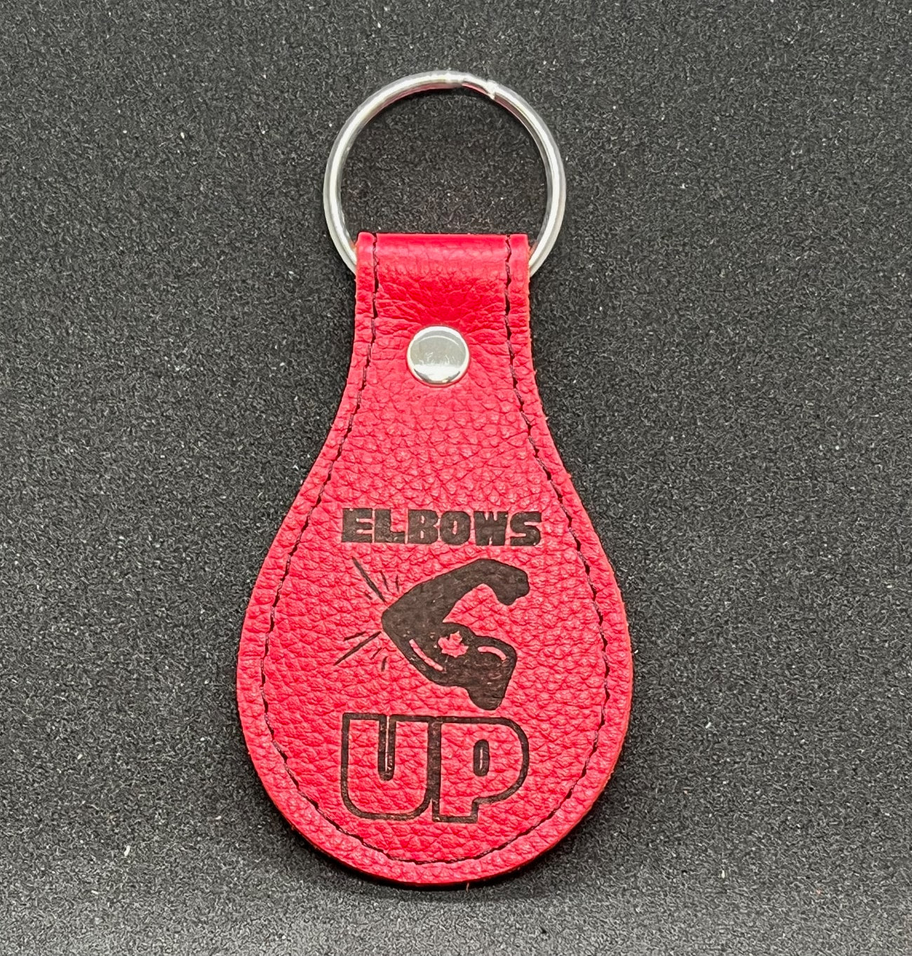 "Elbows Up" red leather keychain