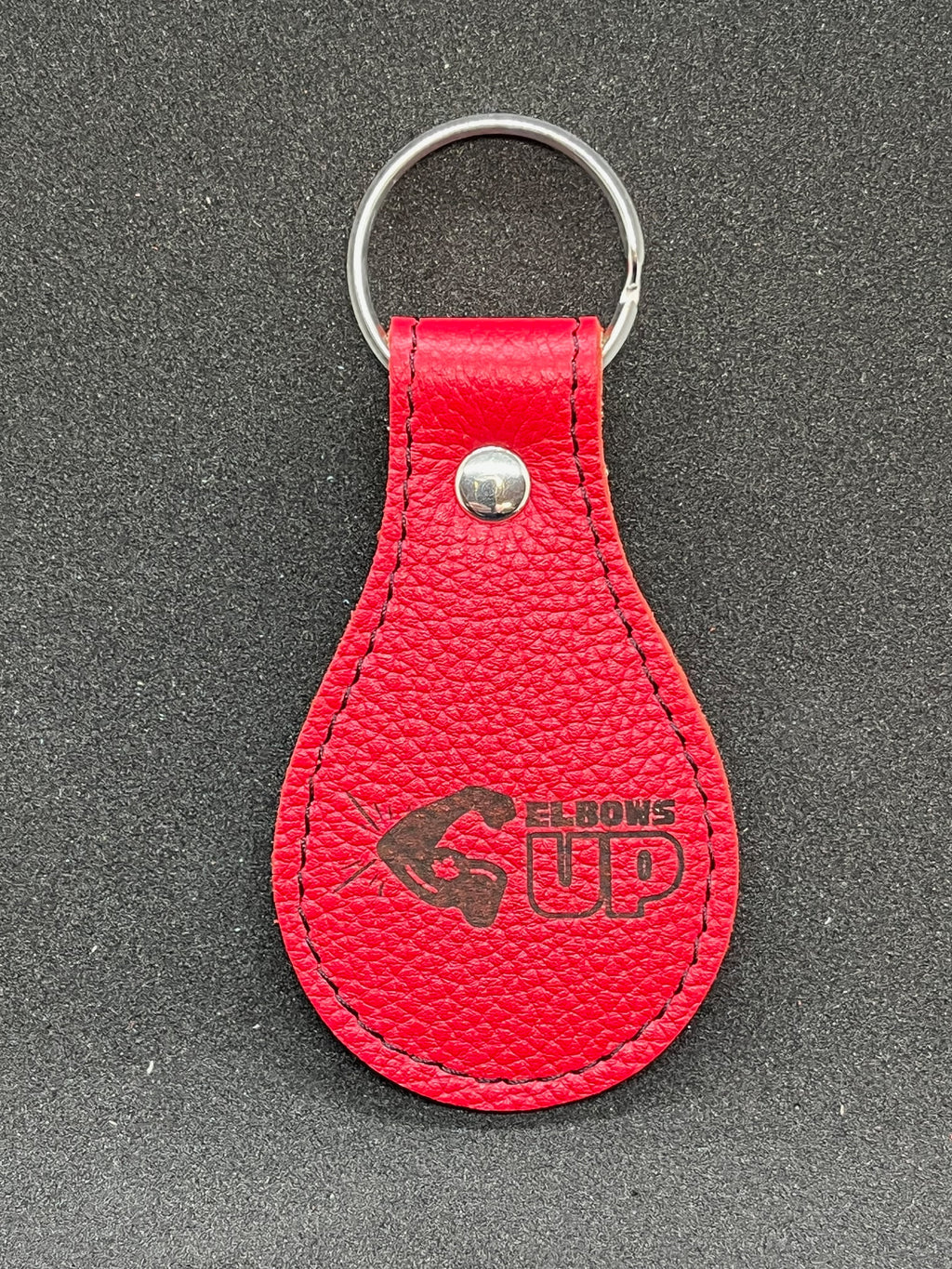 "Elbows Up" red leather keychain