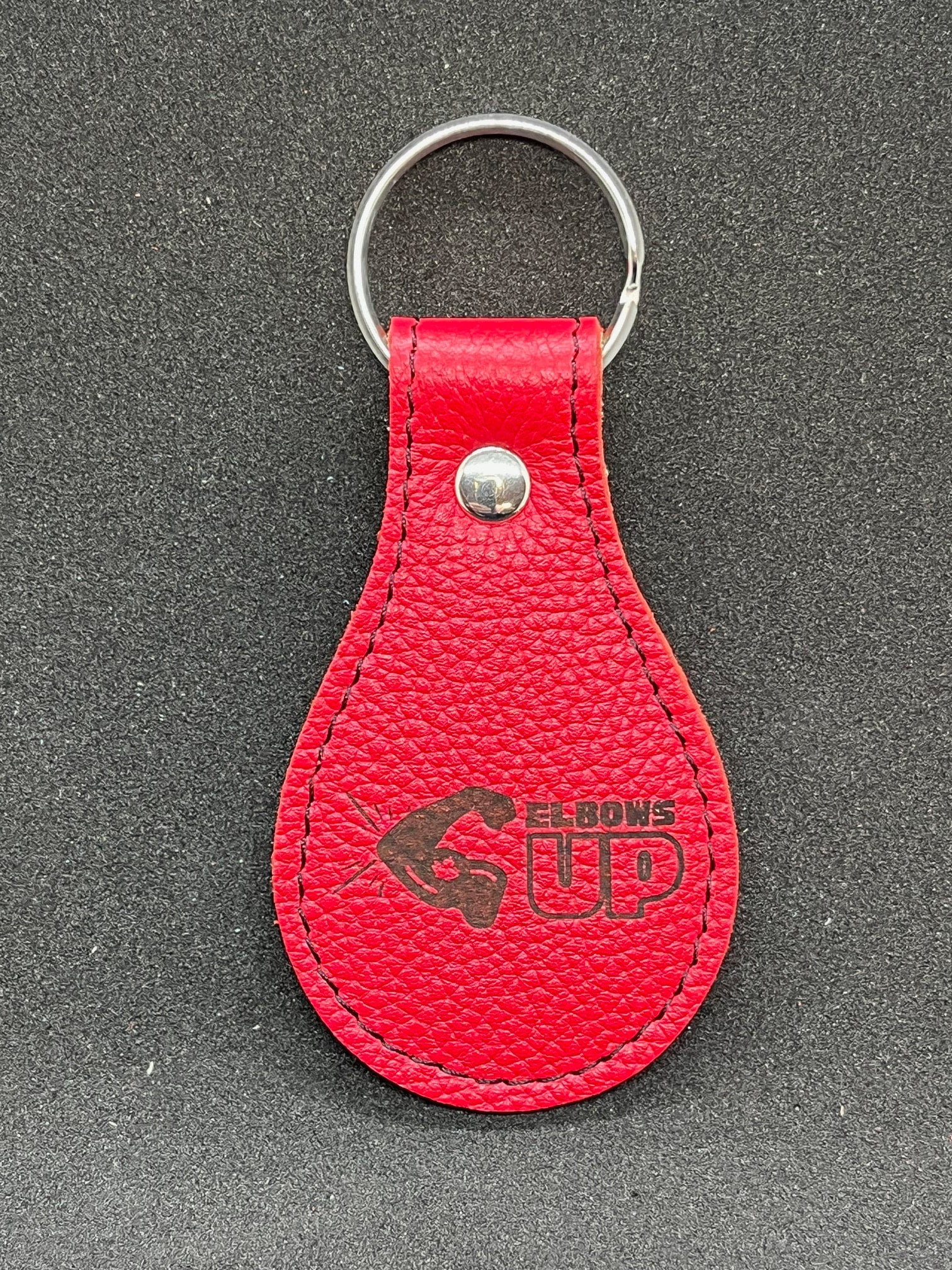 "Elbows Up" red leather keychain