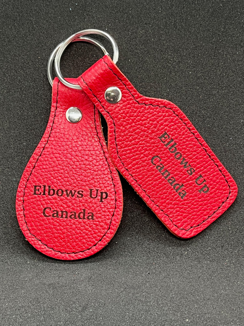 "Elbows Up" red leather keychain