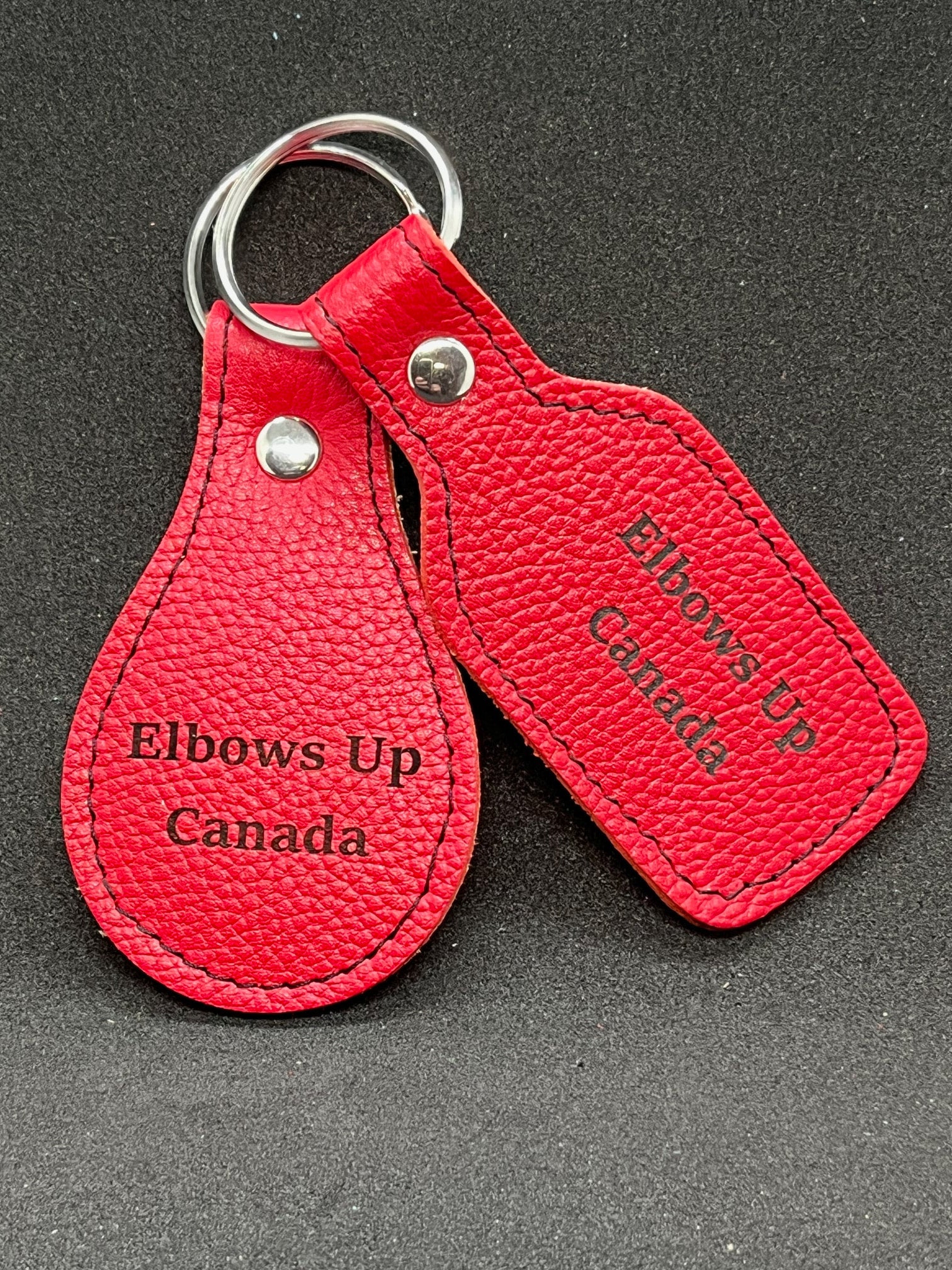 "Elbows Up" red leather keychain