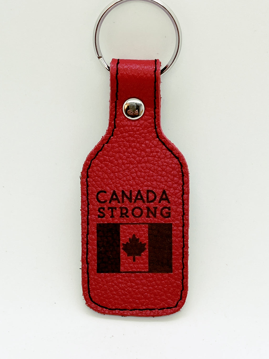 "Canada Strong" red leather keychain