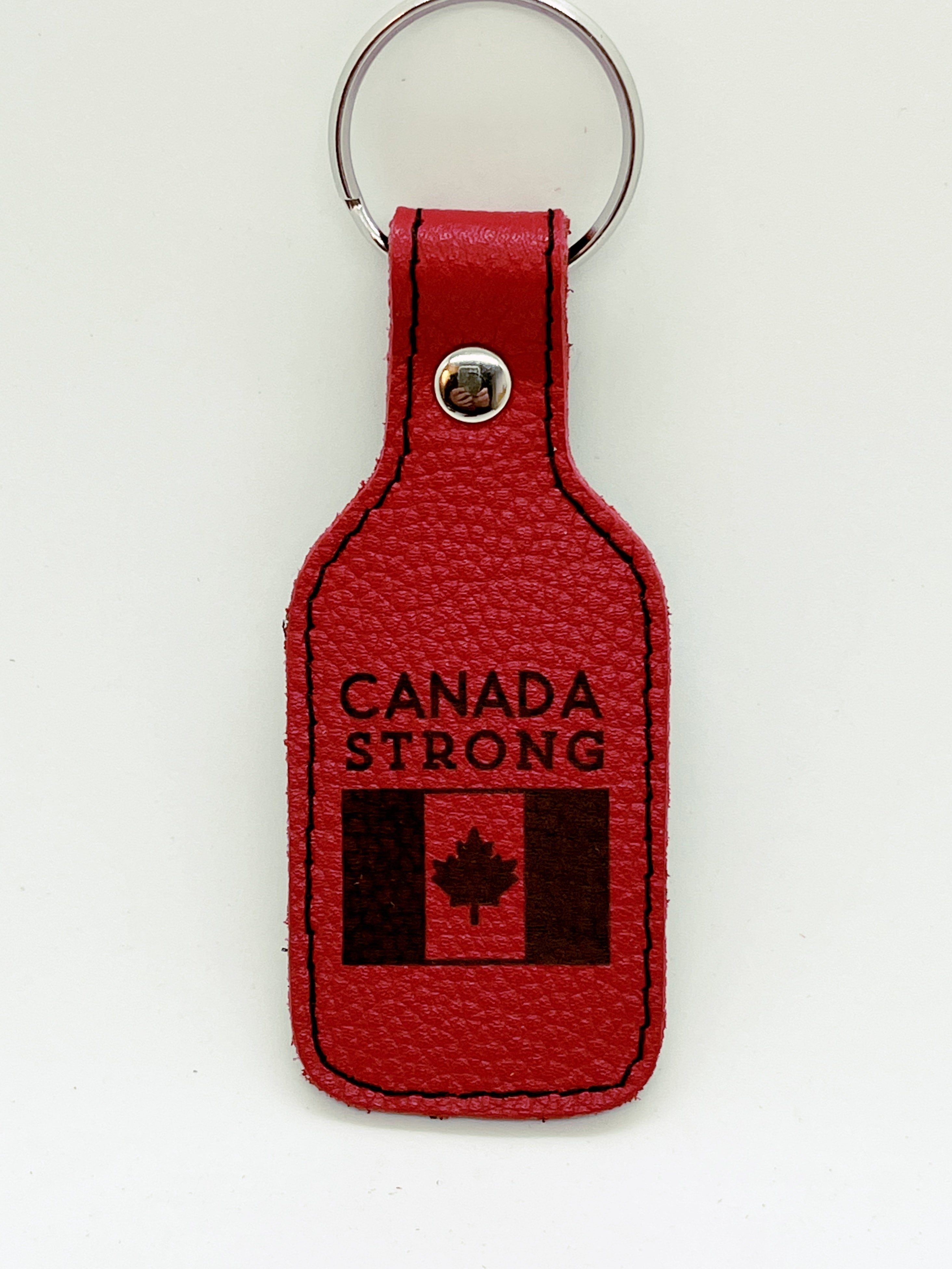 "Canada Strong" red leather keychain