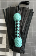 Turquoise and black handle flogger